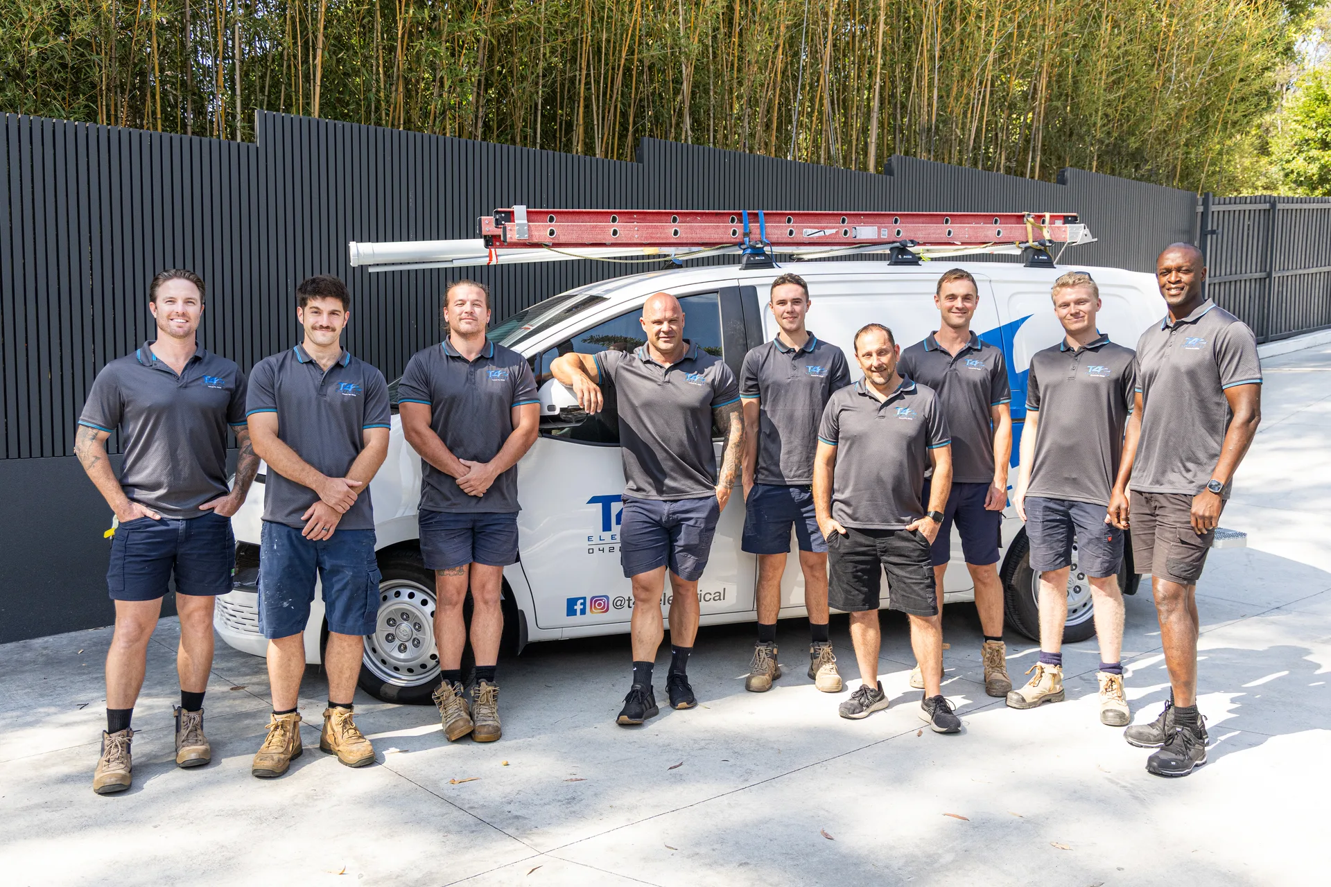 The Family Electrician Reedy Creek team with a service van